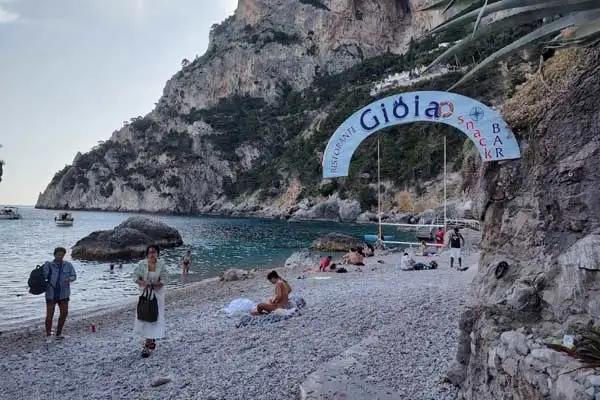 This charming rocky beach beside the Marina Piccolo has a Michelin starred restaurant nearby.