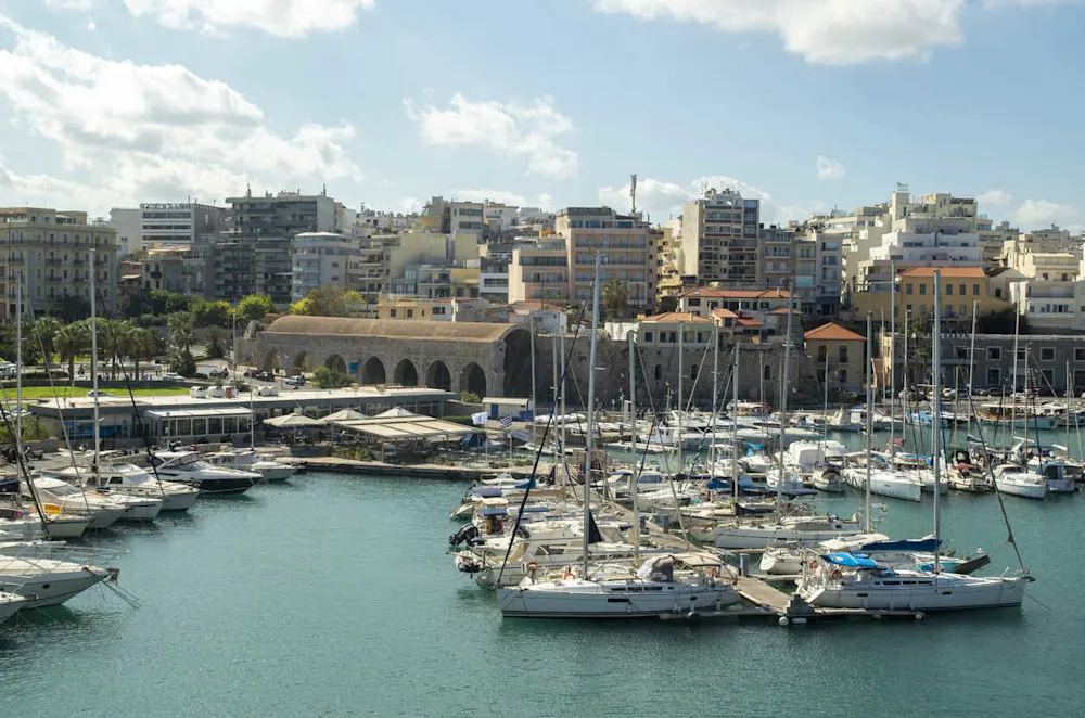 Busy city life with few green spaces and higher housing costs.