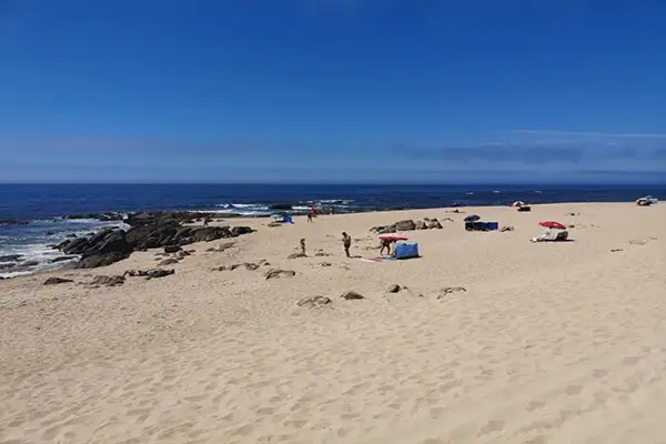 This beach is only a 13-minute Uber ride from Porto's historic center.