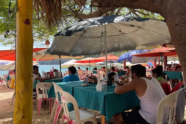 There are several seafood restaurants with tables right on the sand in Santa Cruz.