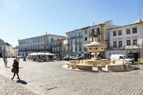 The town square in Évora, Praça do Giraldo, is packed with cafés, shops, and restaurants.