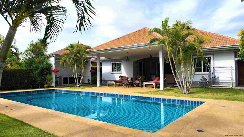 $200K Bali-style home with pool, steps from the beach.