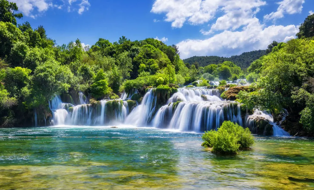 Krka National Park’s waterfalls shimmer with autumn color.