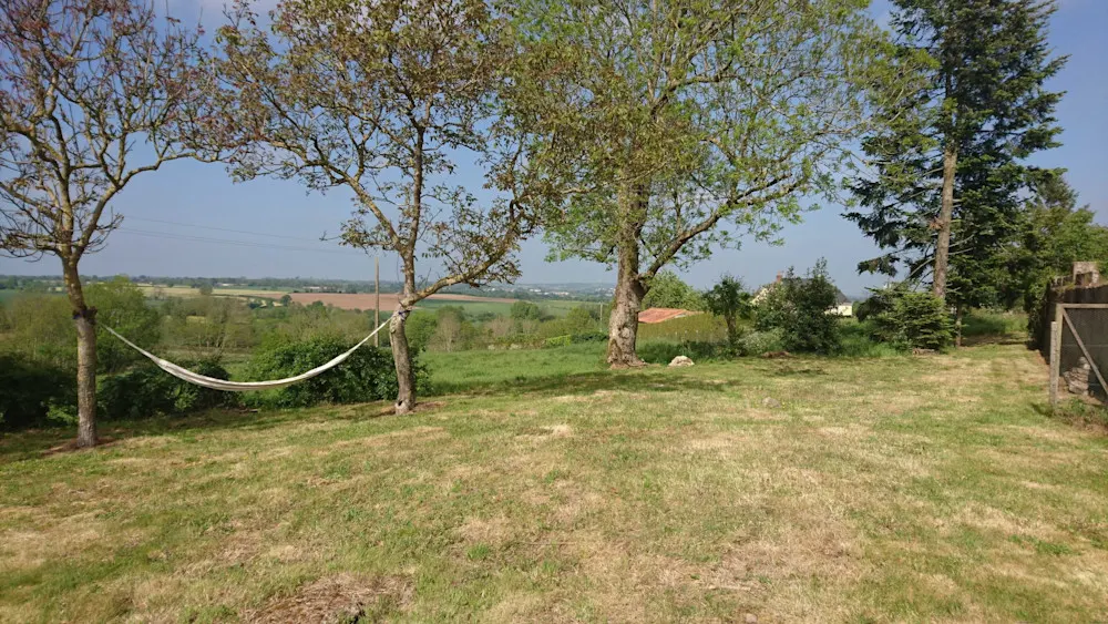 A peaceful countryside view from the backyard of Carolyn’s home in the Vendée.