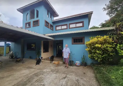 Nic and his husband Bill operate their Lake Arenal dream home as a guesthouse on Airbnb.