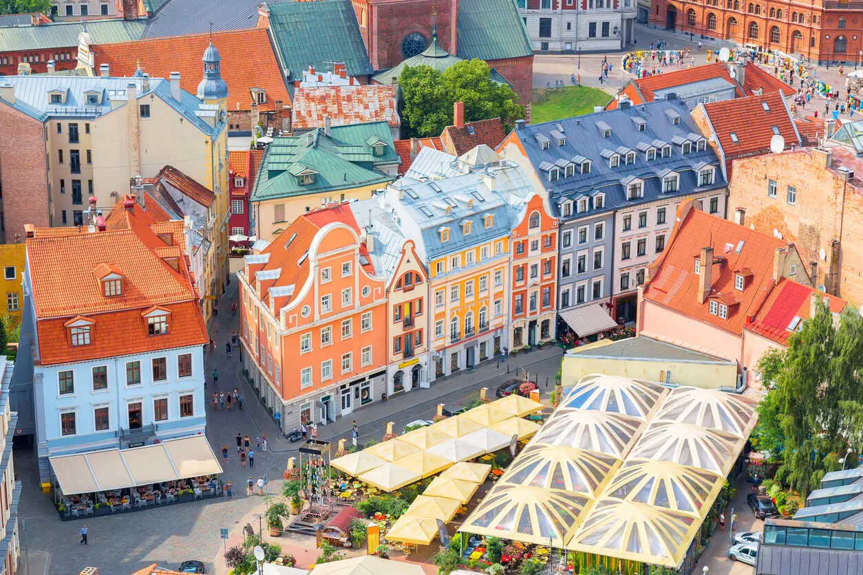 Colorful buildings and vibrant cafes bring charm to Riga’s historic Old Town.