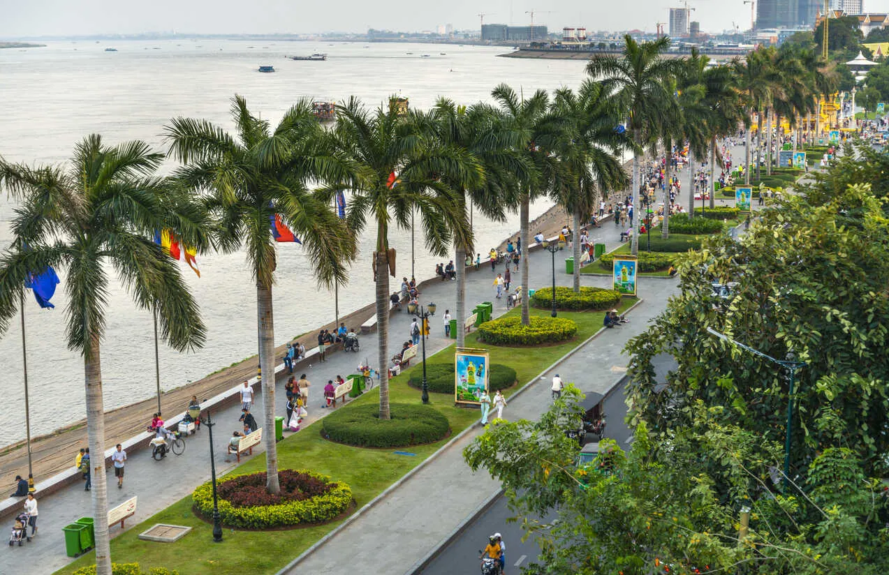 Phnom Penh’s riverside buzzes at dusk with vibrant energy and scenic Mekong views.
