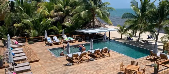 Shane co-owns Placencia Beach Club, a boutique resort in the idyllic seaside town of Placencia, Belize. 