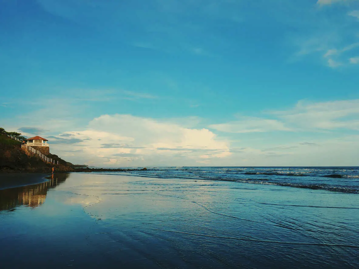 El Cuco's black sand beach: A tranquil coastal escape in El Salvador.