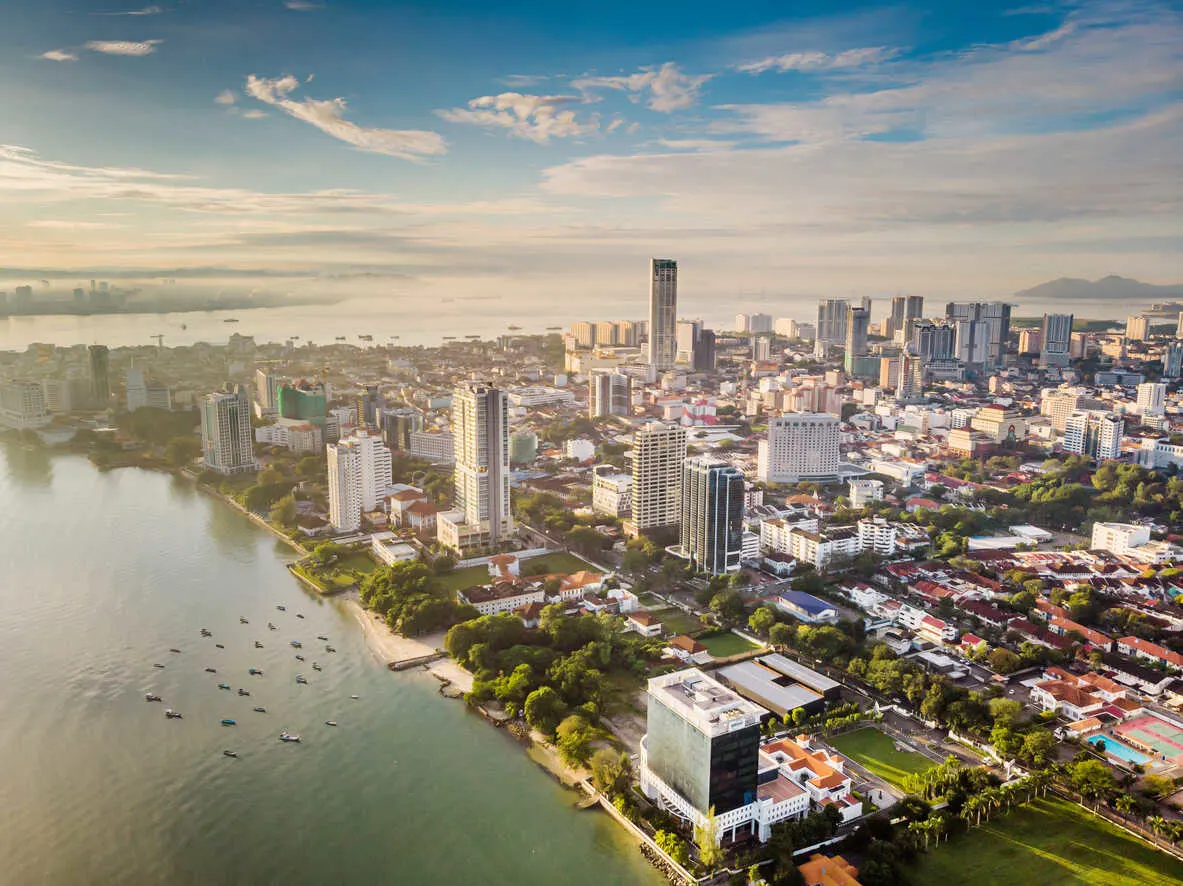 Heritage meets modern life in Penang’s George Town, where island calm and city convenience coexist.