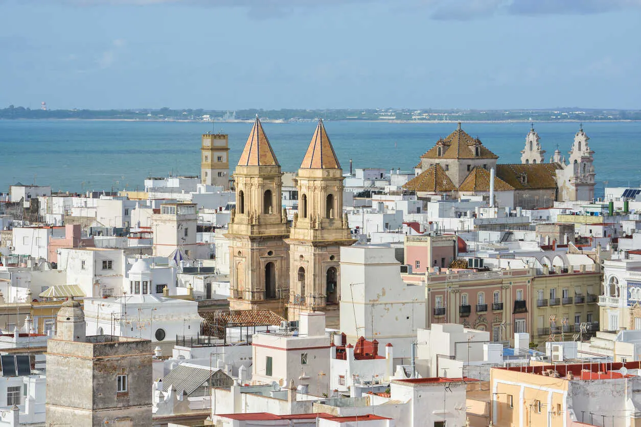 From Torre Tavira, Cádiz unfolds in a patchwork of rooftops, sea, and 3,000 years of history.