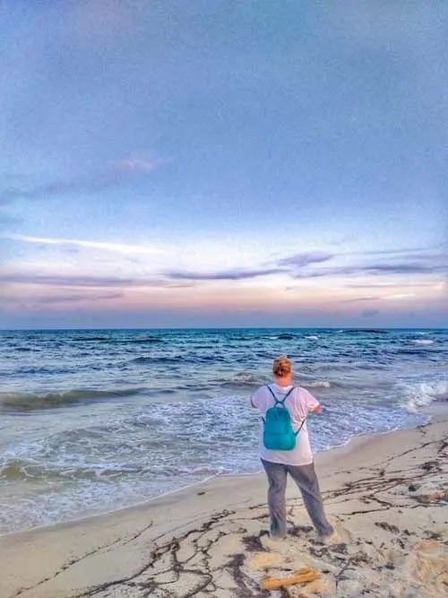 Beach clean ups with Caribbean sunsets. ©Sharon Hansen.