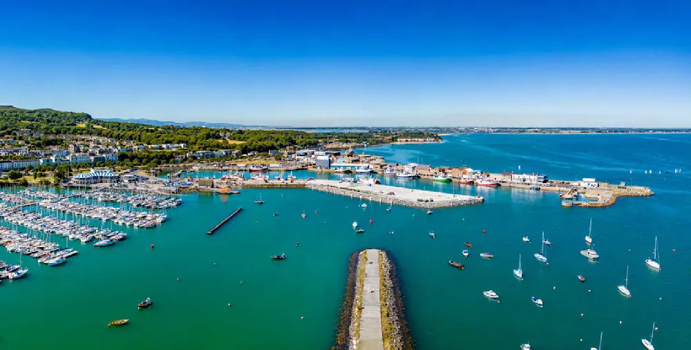 Howth Harbor is full of the hustle and bustle of working fishing boats and leisurely sailing yachts.