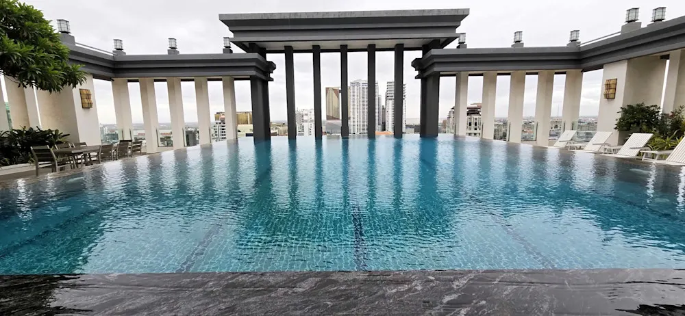 Rooftop pools like this offer Phnom Penh expats a cool escape and sweeping city views.
