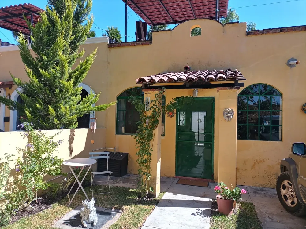 Janet's charming two-bedroom home with a rooftop deck and enclosed patio.