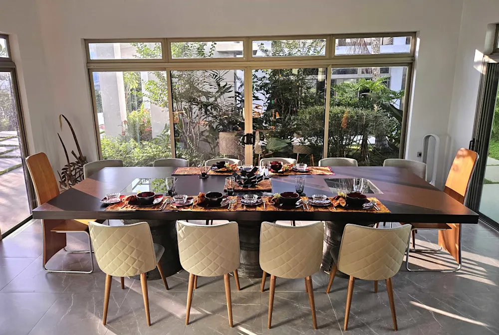 Gatherings happen here—our dining table is the heart of the home.