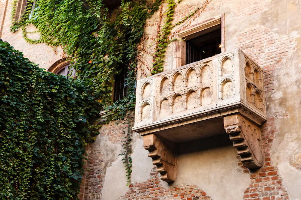 Juliet’s balcony draws visitors to Verona’s romantic heart.
