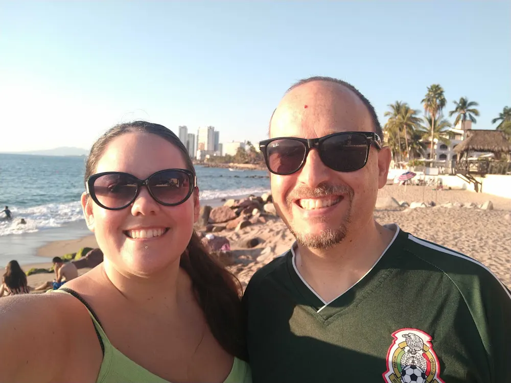 Amy and Curtis soaking up the sun on the Puerto Vallarta coastline.