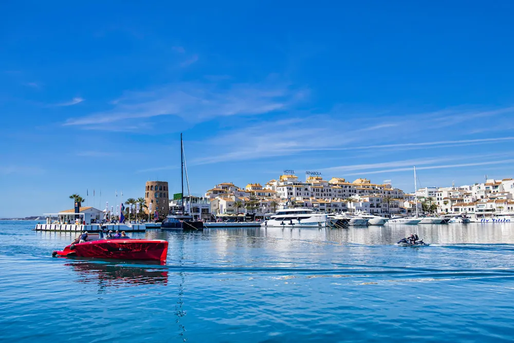 Luxury yachts, designer boutiques, and vibrant nightlife define glitzy Puerto Banús.