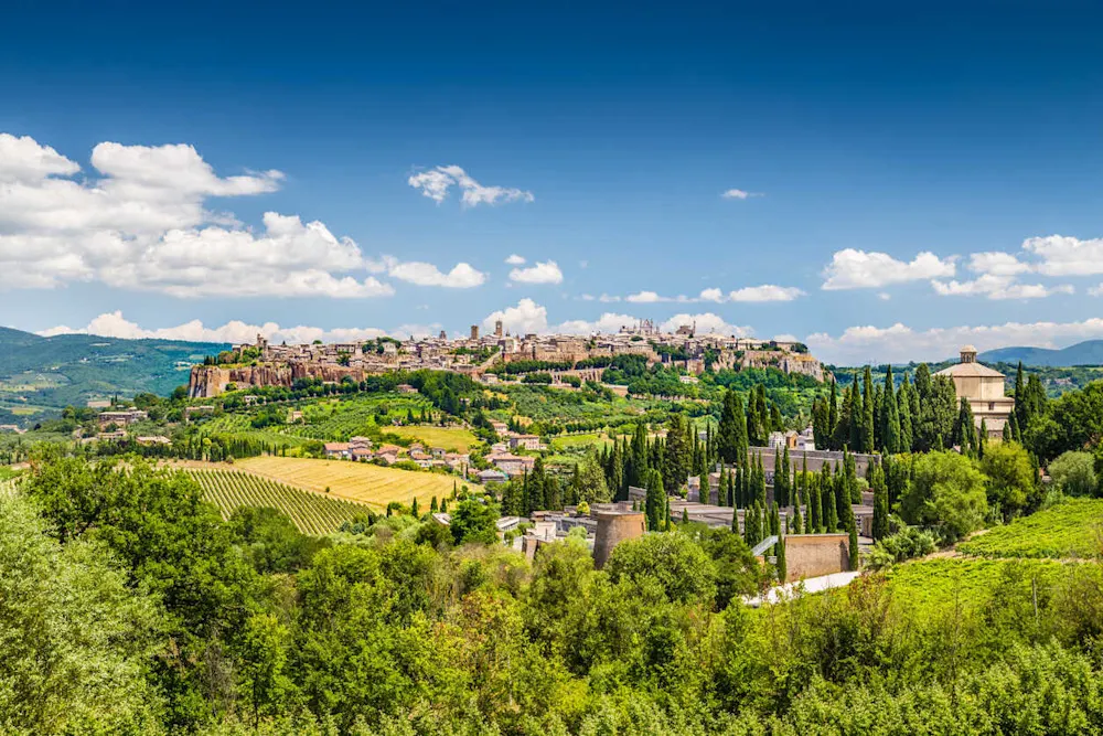 The “Green Heart of Italy” offers small-town charm, art festivals, and peaceful countryside.