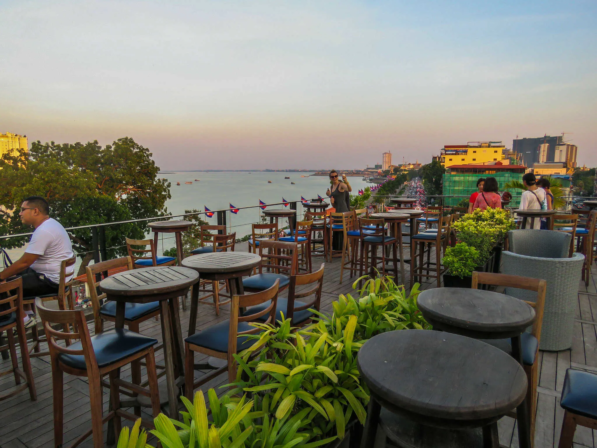 Rooftop dining in Phnom Penh offers stunning views at a fraction of Western costs.