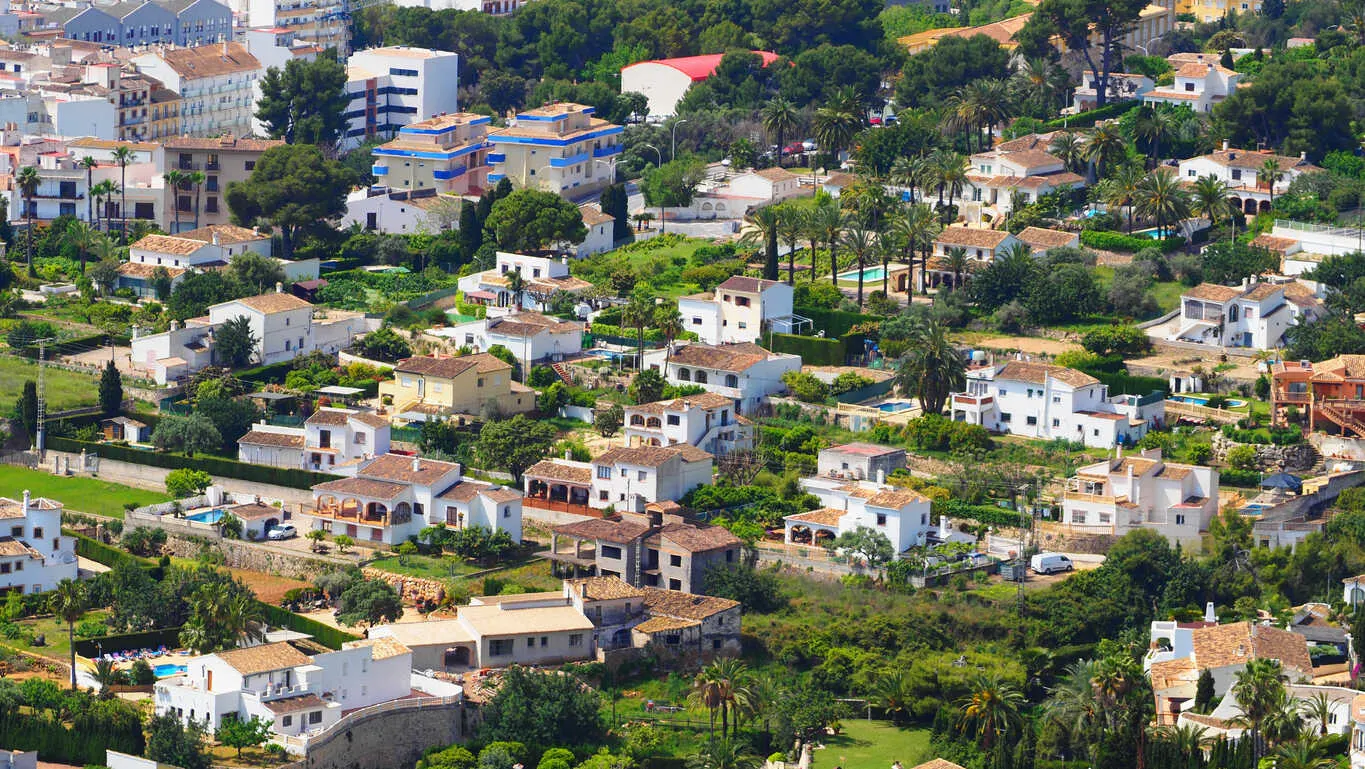 Whitewashed villas dot the hills above Jávea on Spain’s Costa Blanca.