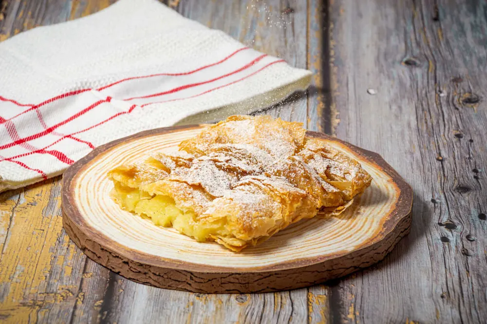 Bougatsa: Serres’ iconic flaky pastry, served sweet or savory with coffee.