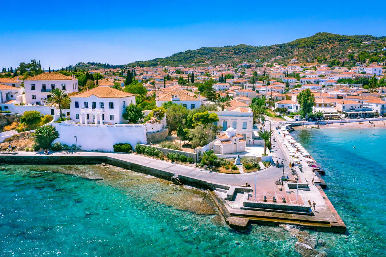 Spetses: Cobblestone streets, luxury yachts, and seaside charm.
