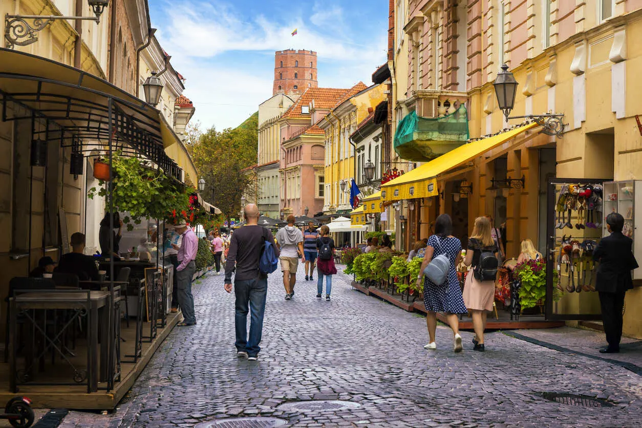 Stroll down Pilies Street in Vilnius Old Town, a vibrant hub of history, culture, and charm.