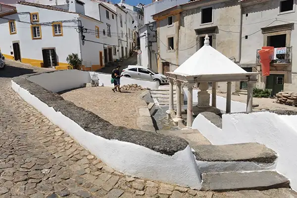 A 16th-century fountain famed for its health-giving waters. Note the renovation going on in the background. It's apparently a restaurant or accommodation.