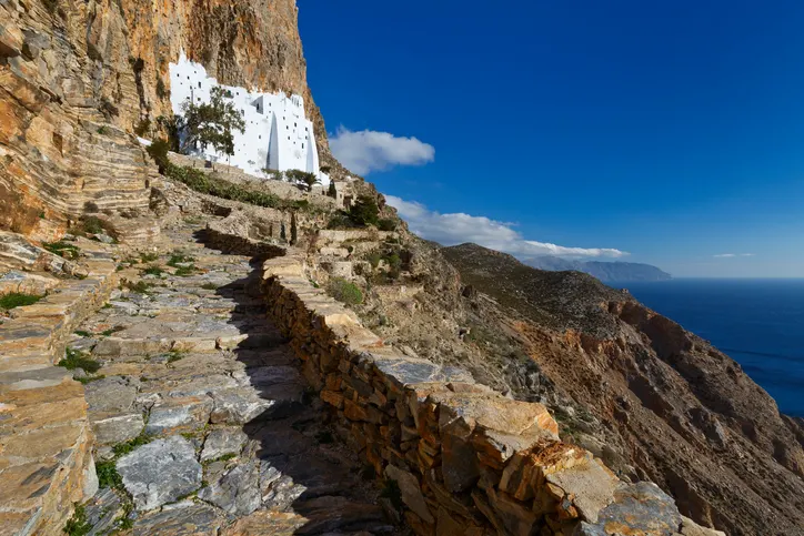 The Monastery of Panagia Hozoviotissa is perched on a cliffside. 