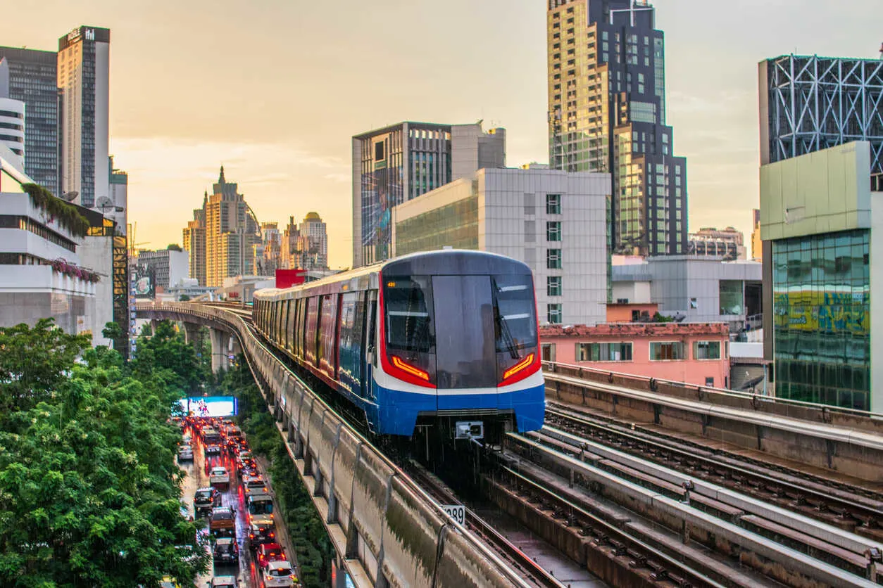 Skytrain gliding through Bangkok, showcasing the city's modern transit system.
