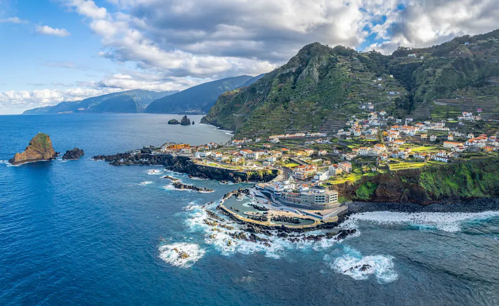 Quiet coastal towns like Porto Moniz offer natural swimming pools and slow-paced charm.