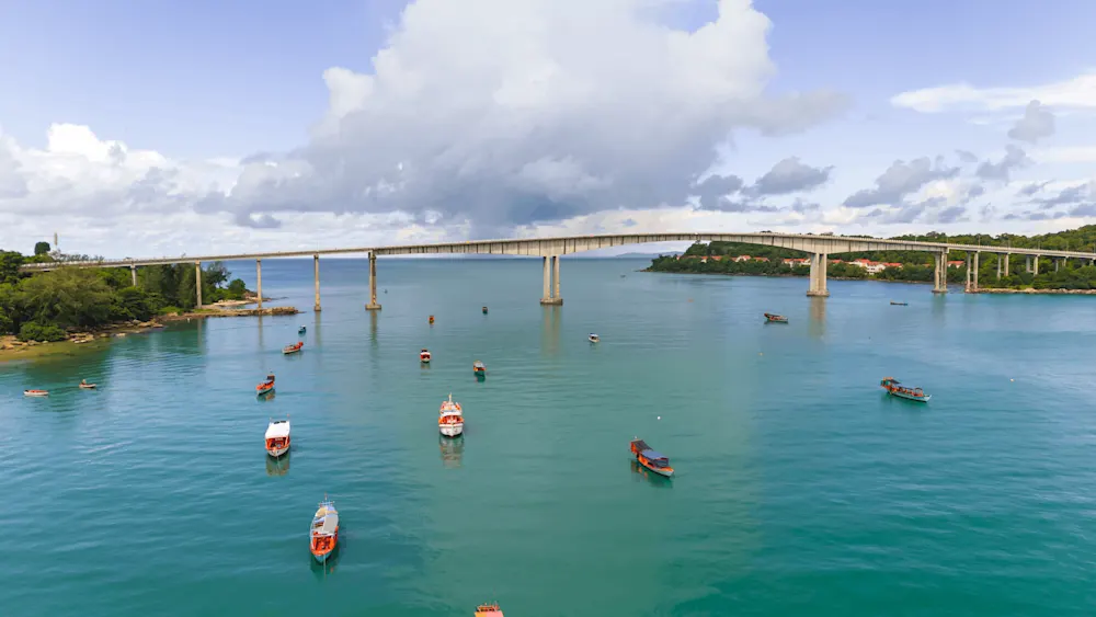 The bridge to Koh Puos stretches across the calm waters off Sihanoukville’s coast.