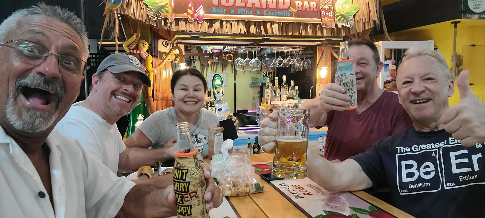 Expats connect over cold beers and lively conversation at The Island Bar’s community gathering.