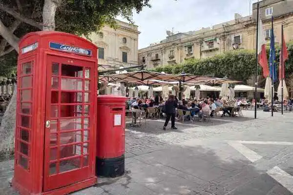 You can still see remnants of British influence in the iconic red phone and postal boxes. ©Kathleen Evans