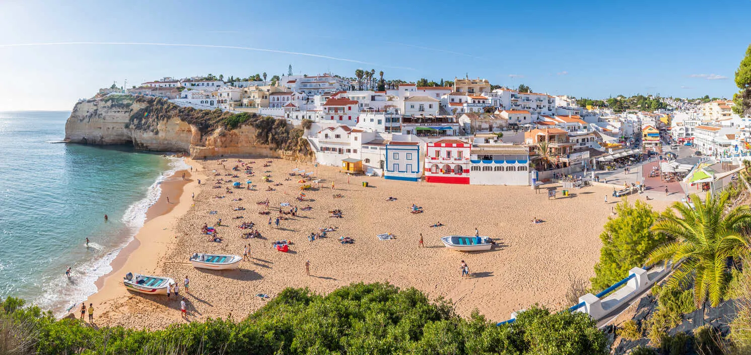 Carvoeiro’s seaside charm blends golden beaches with dramatic caves.