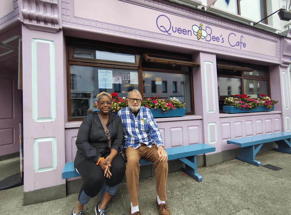 Bea and Barrie outside Queen Bee’s Café, one of their favorite spots in town. 
