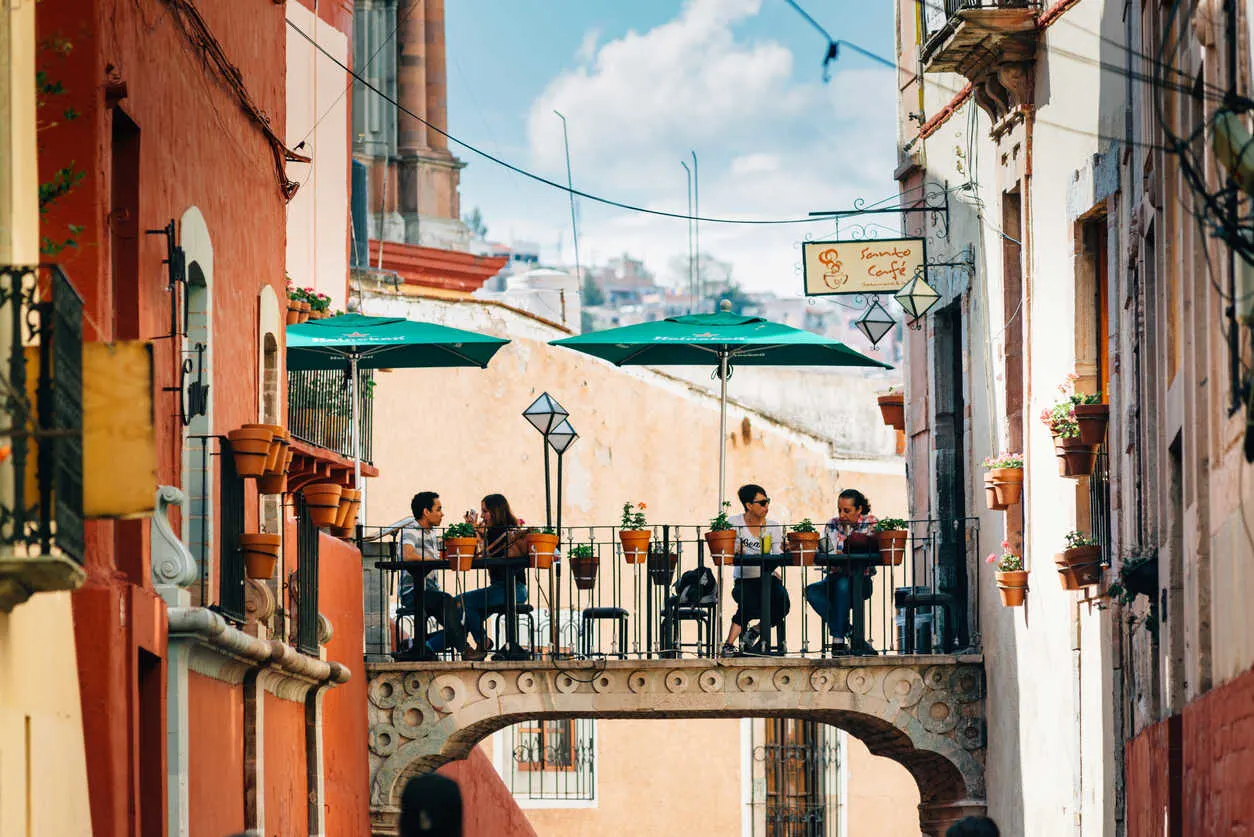Outdoor cafes in Guanajuato offer vibrant street views and local flavors.