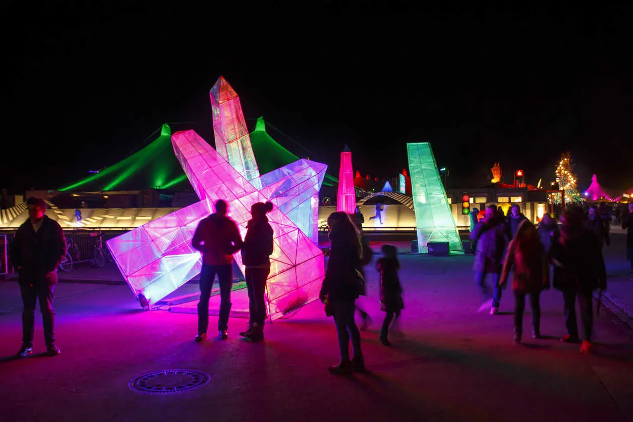 Tents, art, live music, and global food make Tollwood a vibrant winter festival. 