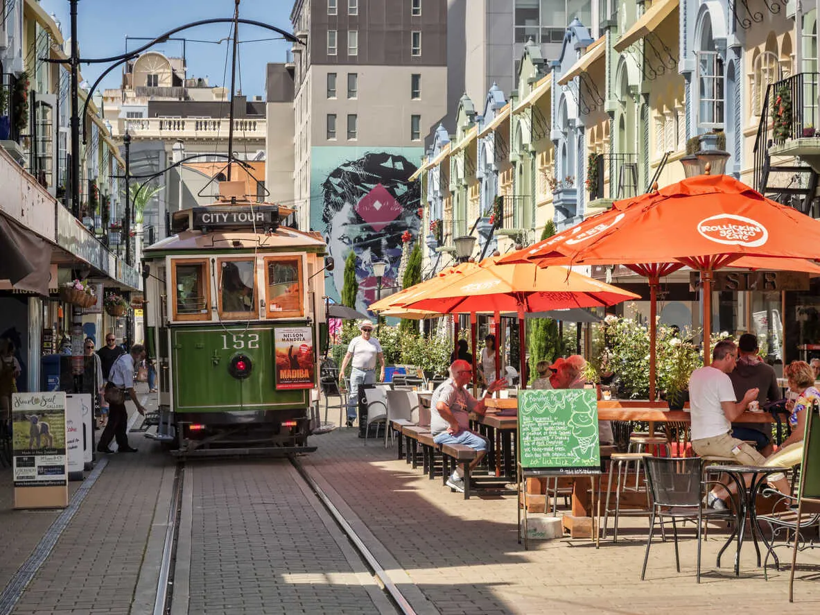 New Regent Street, Christchurch: Vintage trams, shops, and cafes in a charming setting.