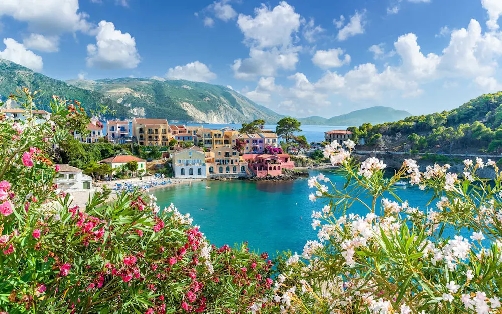 Assos: A charming coastal village with colorful houses and stunning sea views.