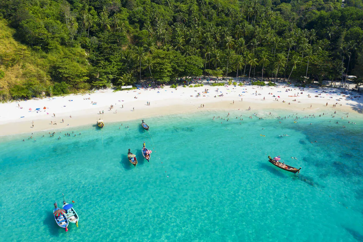 Phuket’s sunny beaches and lively marinas draw seasonal expats each winter.