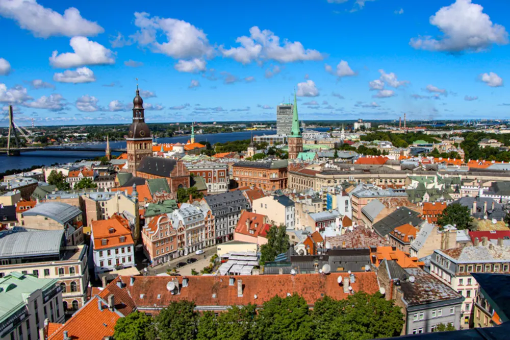 Old Town Riga’s iconic red-tile roofs offer a glimpse into Latvia’s rich past.