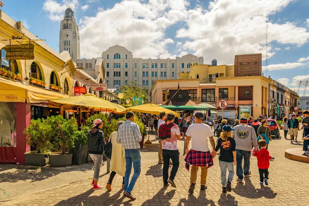 A typical morning in Ciudad Vieja—groceries on foot, fresh air, and conversation.