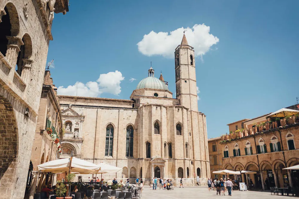 Piazza del Popolo: Ascoli Piceno’s stunning travertine square, a hub of local life, history, and culture.