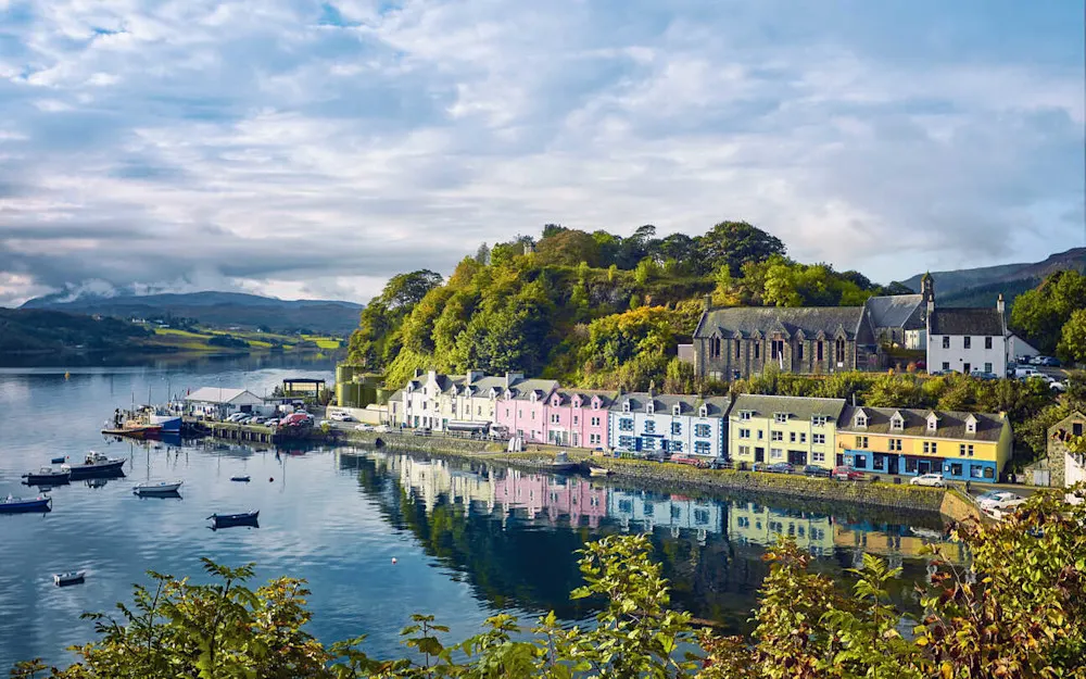 Colorful harbor houses in Portree, the lively heart of the Isle of Skye.