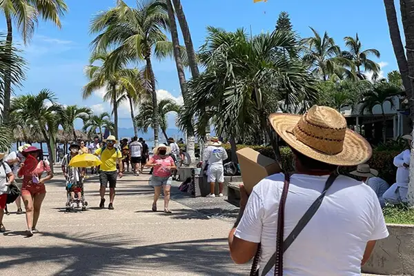 The malecon is perfect for strolling, and you can pick up grilled shrimp, ice cream, cut fruit, or ice-cold coconut water from vendors.