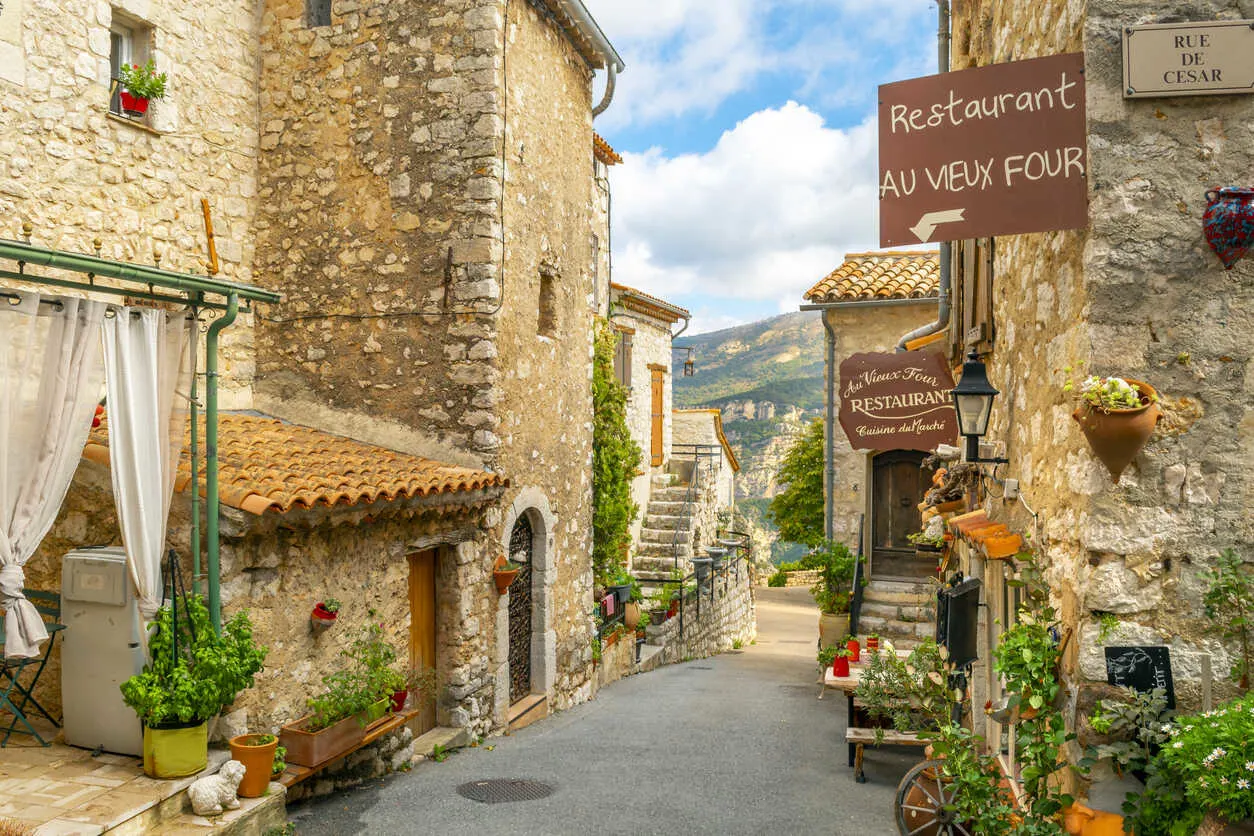 Village life in France means markets, festivals, and universal healthcare.