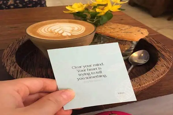 Beautifully presented coffee at Fisherman’s House—complete with biscuit, fresh flowers and note.